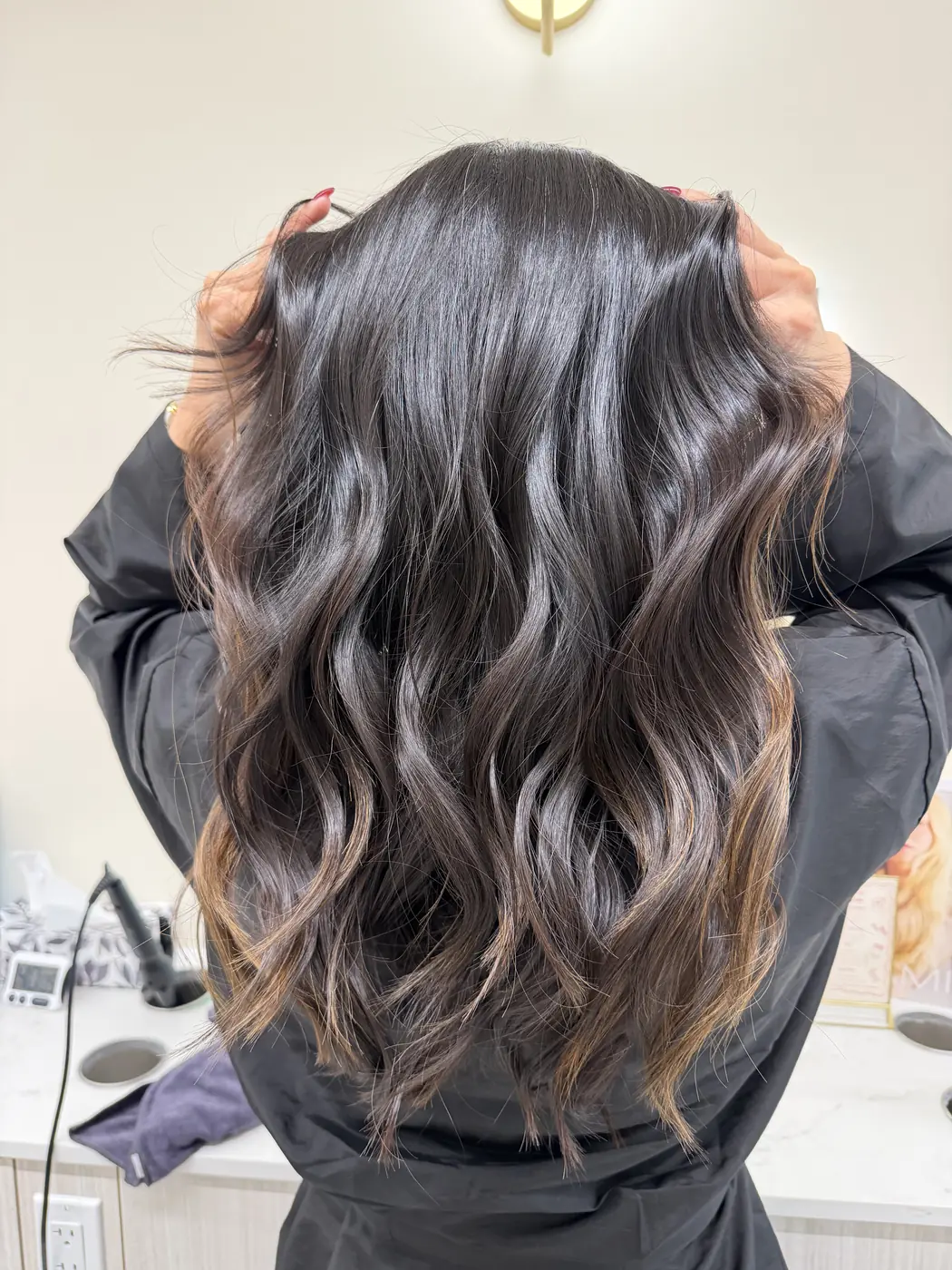Layered brunette cut with soft waves at Salon Dain Forest Hill